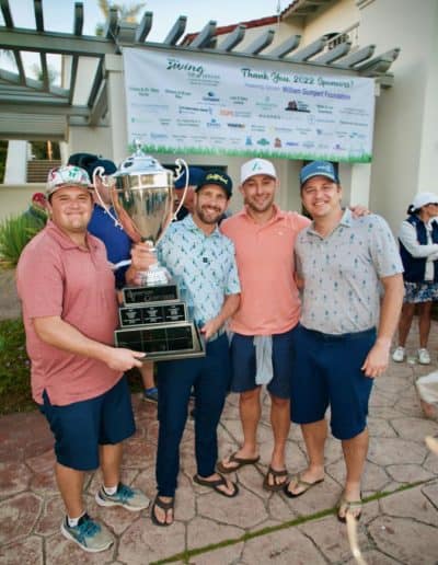 Second Place Golf Foursome - Danny Recht, Jared Sanderon, Scott Schindler, Todd Kirschen Holding Trophy